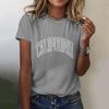 Camiseta feminina de manga curta e estampa de letras, camiseta de Natal solta, redutora de idade, emagrecedora, casual, comércio exterior, roupas femininas transfronteiriças, roupas femininas europeias e americanas