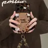 Pulsera de gato KT con estampado de leopardo adecuada para funda de teléfono Apple 18pm iPhone 17 Otoño/Invierno 16 Lindo Dibujo Animado 15 Gamuza