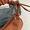 2026 Principios de Primavera Nuevo Diseño de Nicho Estilo Francés Bolso de Hombro Único para Debajo del Brazo Bolso de Mano Plegable Elegante y de Moda para el Trabajo y el Viaje