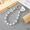 Ins Nuevo Colgante de Llavero con Lentejuelas y Lazo de Perlas para Funda de Teléfono Móvil Accesorios de Correa de Muñeca para Lanyard de Teléfono Móvil