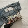 Bolsa de lona floral casual de verano para mujer 2026 nueva elegante personalizada tipo bandolera simple para el hombro