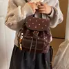 Mochila versátil para mujer estilo coreano retro de lunares para commuting, moderno diseño de tapa abatible, mochila de gran capacidad 2026