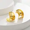 Pendientes de diseño de nicho de personalidad de la moda europea y americana transfronterizos, estilo frío, pendientes de botón exagerados, irregulares, retorcidos, lisos