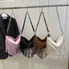 Bolsa de Gran Capacidad para Mujer 2025 Verano Nueva Moda Retro Bolso de Hombro Único Cruzado Bolso con Textura Remache Borla