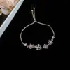 Colgante de Flor Hueca Ovalada de Corazón de Zircón Pulsera Deslizante Pulsera de Lujo Ligero de Gama Alta Pulsera de Moda Versátil