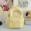 Mochilas Pequenas Leves com Laço de Alta Qualidade no Atacado, Mochilas Escolares Minimalistas Estilo Japonês para Estudantes do Ensino Médio, Bolsas Versáteis de Duas Alças
