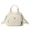 Bolso tote pequeño de lona de nailon ligero, moderno y versátil, gran capacidad, multibolsillos, bolso cruzado de un solo hombro para mujer, bolso de mano