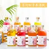 Botella de vino personalizada botella cuadrada botella de vino de frutas sellada con tapa botella dispensadora de bebidas alta apariencia jugo de frutas casero botella dispensadora de mirto