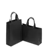 Stock Listo del Fabricante Bolsas No Tejidas Lisas para Textiles del Hogar con Impresión de Logo, Bolsas de Compras de Lona Laminada, Bolsas para Dulces de Halloween