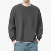 Camiseta de manga larga de color liso para hombre, estilo dos piezas falso, nueva colección primavera y otoño 2025, holgada y versátil, adecuada para usar en capas, sudadera de algodón con cuello redondo