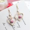 B448 Corea del Sur Dongdaemun más vendidos encantadores aretes de botón de bola de tela de perlas aretes de señora moda aretes rojos de red para mujer