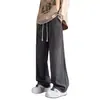 Pantalones casuales de moda retro de calle estilo americano con una variedad de elementos de diseño, corte holgado, tejido, pierna recta, lavado y favorecedores para la figura