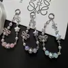 Colgante de cadena para teléfono con lazo de estrella plisado estilo Ins, llavero de alta gama y accesorio para bolso al por mayor