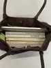 Bolso de gamuza para mujer, gran capacidad, nuevo bolso de hombro vintage esmerilado otoño e invierno 2026, bolso tote de alta gama para el trabajo
