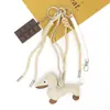 Huayang En Stock Perro Salchicha Colgante Llavero de Perro de Cuero Accesorio Versátil para Bolso Decoración de Coche Festival de Medio Otoño Pequeño Regalo