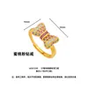 Anillo de Mujer Estilo Lujo Ligero Vintage Retro Nicho Gama Alta Dorado Arena Microincrustado Moño Rosa Melocotón, Regalo para Novia