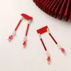 Ambiente festivo de vacaciones año nuevo borla roja cuentas de arroz pegatinas de tela flor para zapatos accesorios para el cabello clip de borde parche para zapatos bolsa ropa