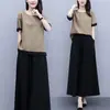 Conjunto de verão feminino, plus size, de corte solto, projetado para corpos curvilíneos, adequado para mães de meia-idade, com um visual jovem e estiloso, apresentando calças de perna larga e uma saia em um conjunto de duas peças.