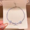 Pulsera Colgante Mariposa de Circonita Super Brillante Lujo Ligero Moda de Alta Gama Exquisito Anillo de Mano Dulce Versátil Nicho Joyería de Mano para Mujeres