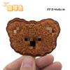 Venta al por mayor de fábrica nuevos stickers de tela con cabeza de oso de cuatro colores LOGO gabardina universal para hombre y mujer