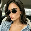 Gafas de sol retro ovaladas sin montura estilo europeo y americano para mujer, hacen que la cara se vea más pequeña, gafas de sol negras de moda casual estilo europeo y americano con protección UV
