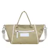 Bolso de Hombro de Lona Nuevo Diseño de Nicho 2026 Versión Coreana Bolso Tote de Nicho para Mujer Ligero Bolso de Hombro Sencillo