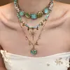 Collar Transfronterizo Nuevo Estilo Punk Resistente con Colgante de Fresas y Mariposas, Cadena para Clavícula Exagerada con Colgante de Flores y Estallido Estelar de Moda y Único