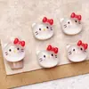 Cara de garabato caricatura Sanrio accesorios para uñas melody gato KT kulo pudín de arroz perro accesorios para uñas accesorios pequeños