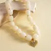 Collar de cuentas geométricas degradado colorido transfronterizo europeo y americano, cadena para la clavícula estilo resort de playa, joyería de lujo ligero de alta gama al por mayor