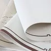 Alfombrilla cuadrada de cuero estilo chino nueva en stock para uso en hotel y hogar, impermeable, antideslizante y resistente al calor. Diseños personalizados disponibles para venta al por mayor