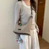Bolsa Preguiçosa Estilo Coreano para Mulheres Verão 2026 Tecida Vazada Grande Capacidade Bolsa de Ombro Bolsa Tote para o Trabalho Bolsa de Praia para Férias