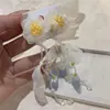 Pendientes hechos a mano con borlas de cuentas de flores estilo vacacional junto al mar pendientes estilo hada estilo Mori atmósfera exagerada pendientes largos