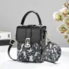 Bolsas pequeñas de mujer transfronterizas 2026 moda de moda bolsos de nicho de alta calidad bolsos tipo caja bolsos para teléfono bolsos cruzados bolsos de mujer