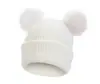 Chapéu de tricô infantil novo transfronteiriço chapéu de lã para bebê com duas bolas cor sólida chapéu quente chapéu de outono e inverno para bebê