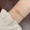 Pulseras de hilo con mariposa de circonita cúbica, exquisitas y a la moda, de estilo japonés y coreano, que exudan un ambiente elegante, lujoso y versátil, con un aspecto de alta gama y deslumbrante - disponibles al por mayor