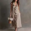 Ropa de mujer de comercio exterior transfronteriza europea y americana, nuevo estilo de verano, vestido casual de color liso suelto sin mangas con encaje y cuello en V