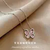 Collar de mariposa de cristal de fresa diseño de nicho de lujo ligero cadena de clavícula de alta calidad femenina estilo simple de verano nueva moda temperamento