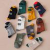 Calcetines Zhuji para hombre, de tubo medio, antiolor, absorbentes del sudor, para primavera y otoño, en blanco y negro, deportivos, sin algodón, para todo tipo de partidos.