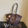 Bolso Retro de Alta Gama Transfronterizo para Mujer 2026 Nuevo Estampado de Leopardo Bolso de Hombro Individual Gran Capacidad Bolso Tote Versátil
