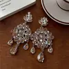 Pendientes de botón con borla de gota de agua incrustada con diamantes en aguja de plata, joyería para orejas de lujo ligero de alta gama, moda, pendientes exquisitos, diseño personalizado de nicho, sentido de diseño