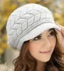 Chapéu feminino outono e inverno versão coreana de pelo de coelho chapéu de lã brilhante feminino inverno proteção de ouvido quente chapéu de pelo de coelho bico de pato atacado