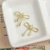 Una Variedad de Colgantes de Lazo de Aleación Dulces y Frescos Joyería Hecha a Mano DIY Collares de Mano Pendientes Colgantes Accesorios Materiales