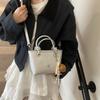 Bolso pequeño de alta gama para mujer, novedad de 2025, bolso bandolera informal combinable, bolso de cubo portátil para ir al trabajo al estilo coreano.