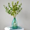 Taobao Tmall suministro al por mayor tienda de decoración del hogar planta de simulación floral hoja verde simulación madera borracha reloj de pared hoja