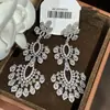 Pendientes de Borla Hueca con Flor de Zirconia Transfronterizos Europeos y Americanos, Pendientes de Lujo Ligero de Gama Alta, Accesorios para Orejas de Nicho Modernos y Únicos para Mujer