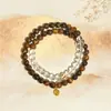Estilo de Temperamento Gentil y Noble Nuevo Estilo Chino Pulsera de Cristal Amarillo Ojo de Tigre Doble Círculo para Girar la Suerte Regalo de Nicho de Alta Gama Disponible al por Mayor