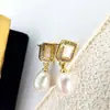 Pendientes de Perla de Agua Dulce Azucarillo Botella de Perfume Belleza para Mujer Aguja S925 Lujo Accesible Pendientes de Nicho Combinación Otoño e Invierno Estilo Ins