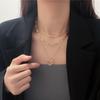 Cadena de suéter con colgante de corazón calado multicapa simple nuevo japonés y coreano, cadena para clavícula de diseño artístico de lujo accesible a la moda para mujer