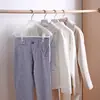 Percha de plástico de hombro ancho de aluminio sin imprimir con gancho de aluminio percha de hombro ancho para traje de hotel perchero para pantalones perchero al por mayor