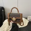 Estética Tendência de Nicho Alta Qualidade Outono 2026 Nova Moda Vintage Elegante Bolsa de Mão Bolsa de Ombro Transversal Transfronteiriça